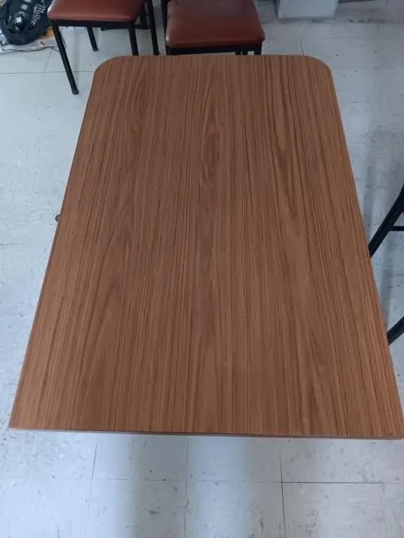 Table 42in x 27in with four chairs.