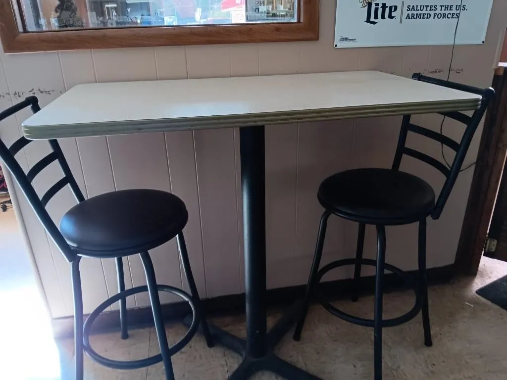Bar height table 42x24x41.5 & two bar stools.