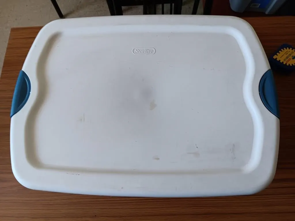 Storage totes with lids. Three of them are 21in.