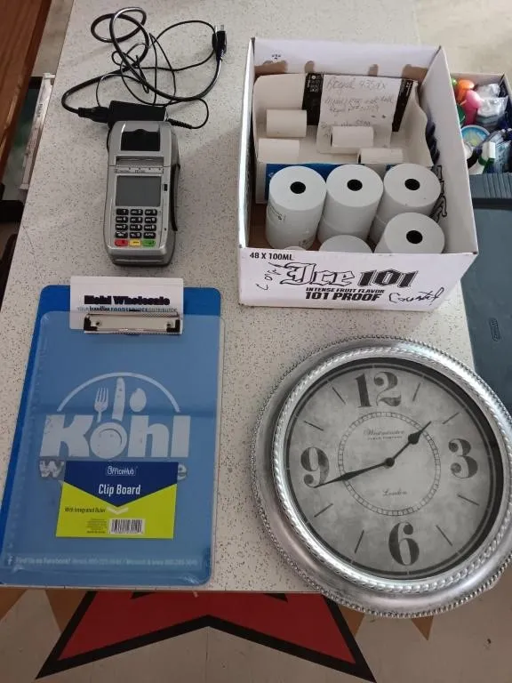 Office Supplies and clock.
First Data FD 130