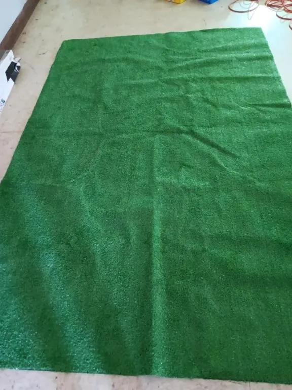 Indoor/outdoor carpet piece, approximately 89x60