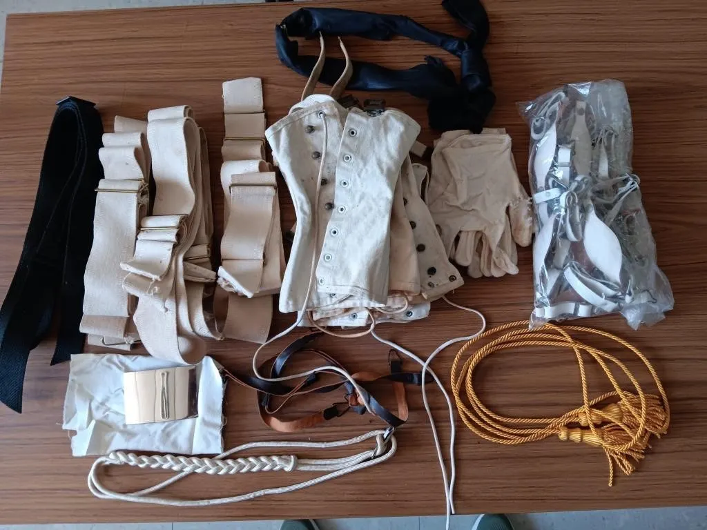 Box containing vintage Gaiters, Gloves, Belts,