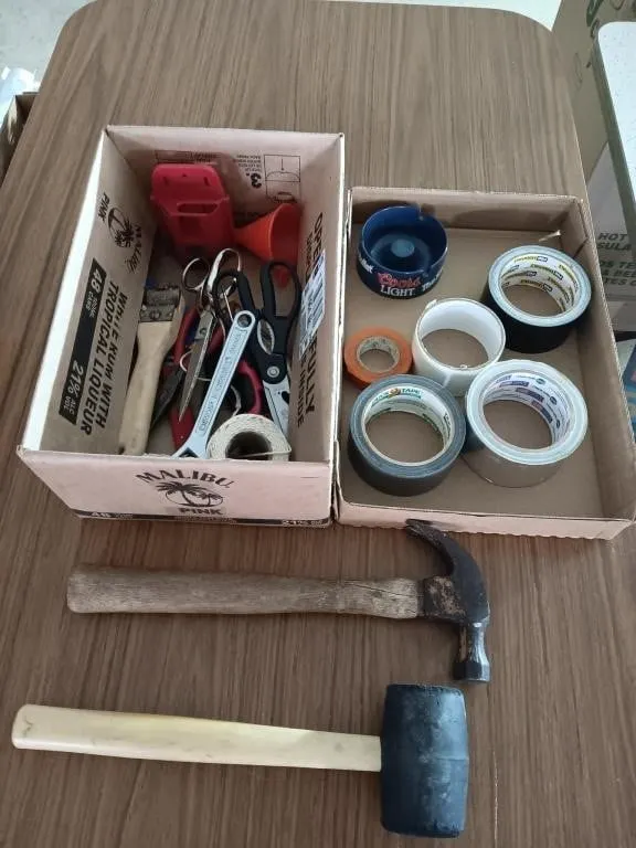 Assortment of hand tools, duct tape and