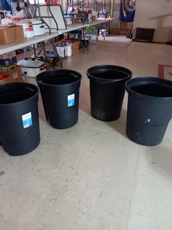 Four 18 gal trash cans