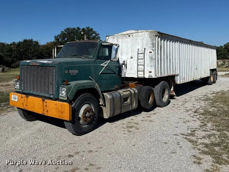 1981 GMC semi truck with grain trailer