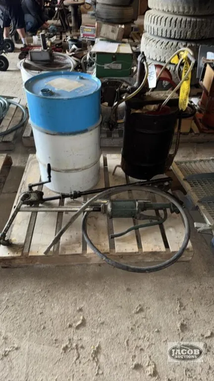 LOT OF GEAR OIL AND HAND PUMPS