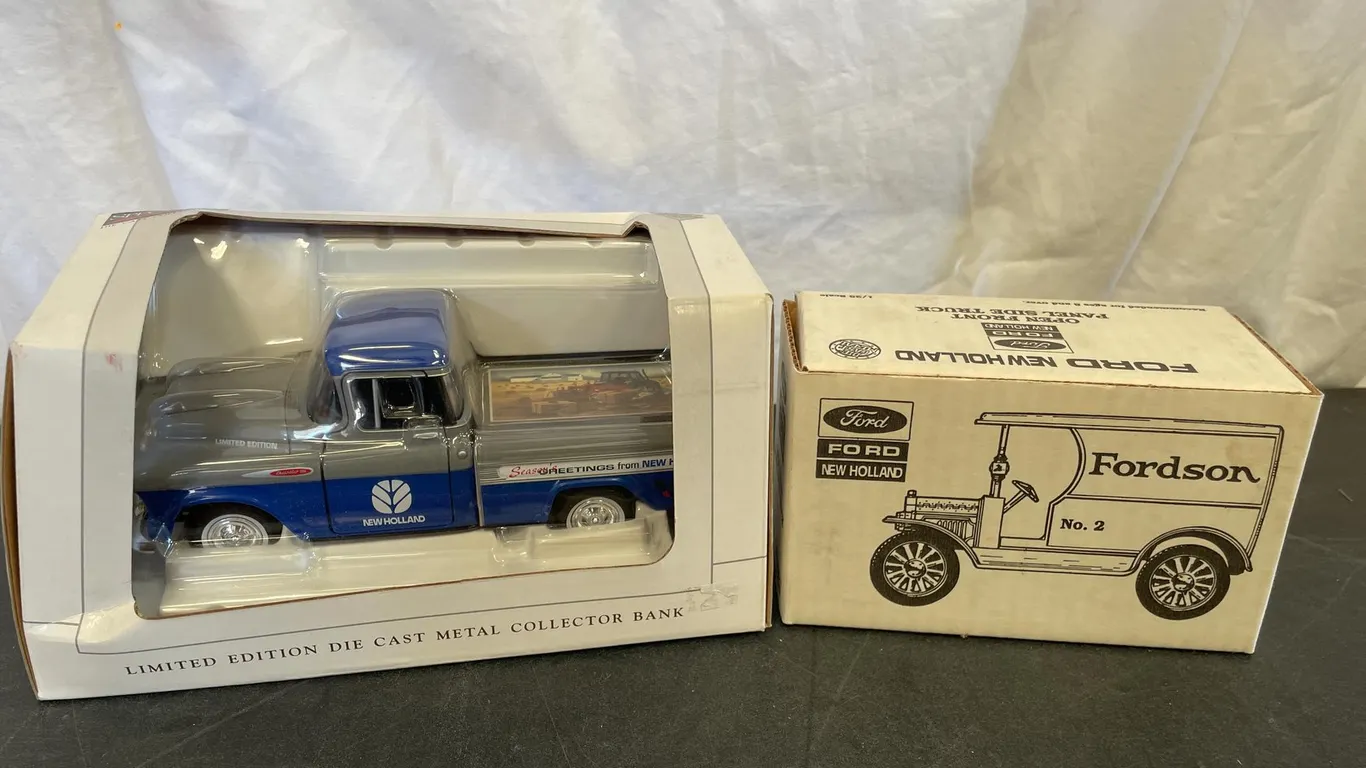 (2) New Holland Trucks