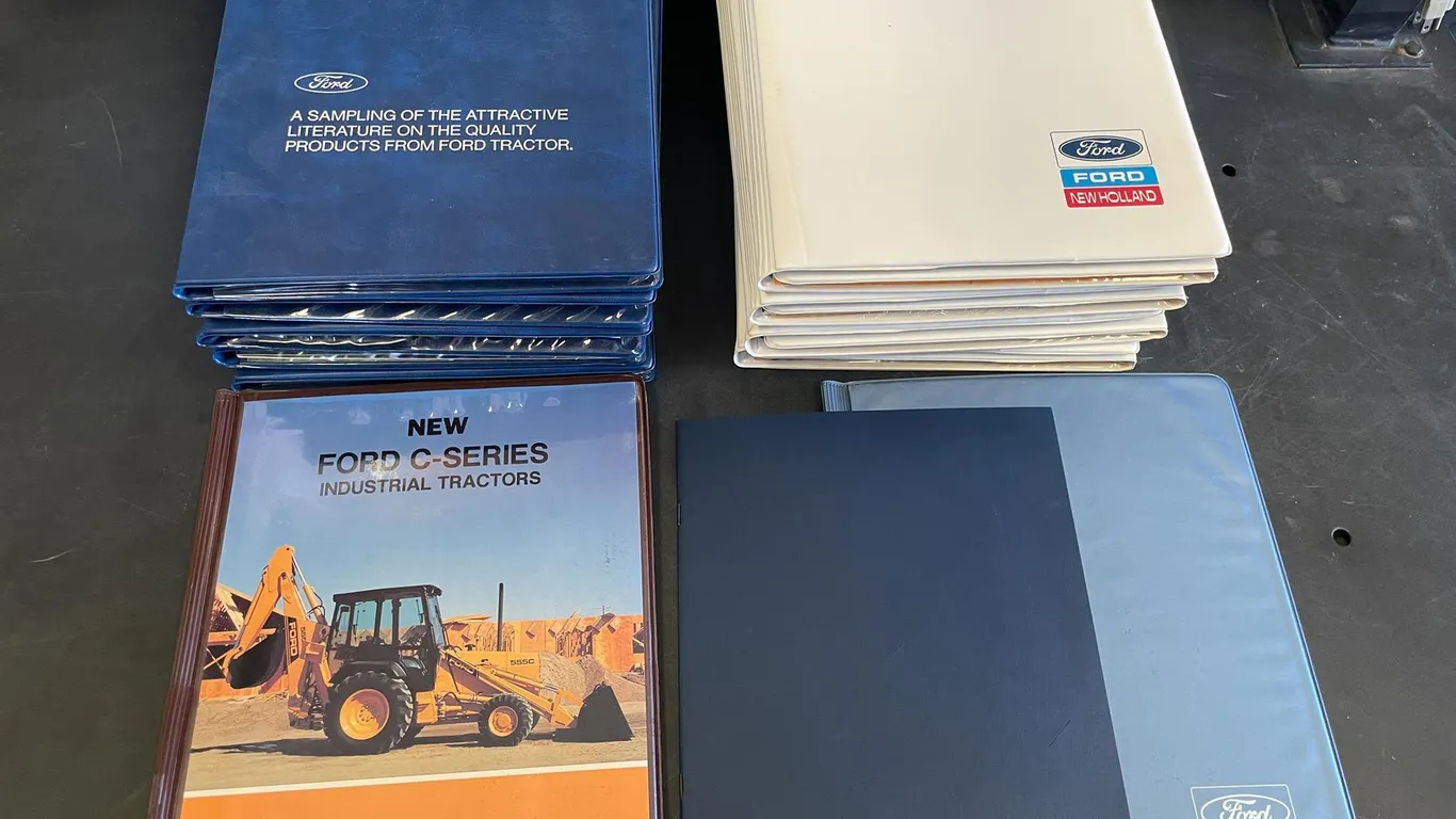 (12) Folding Binders Full of New Ford/New Holland Literature