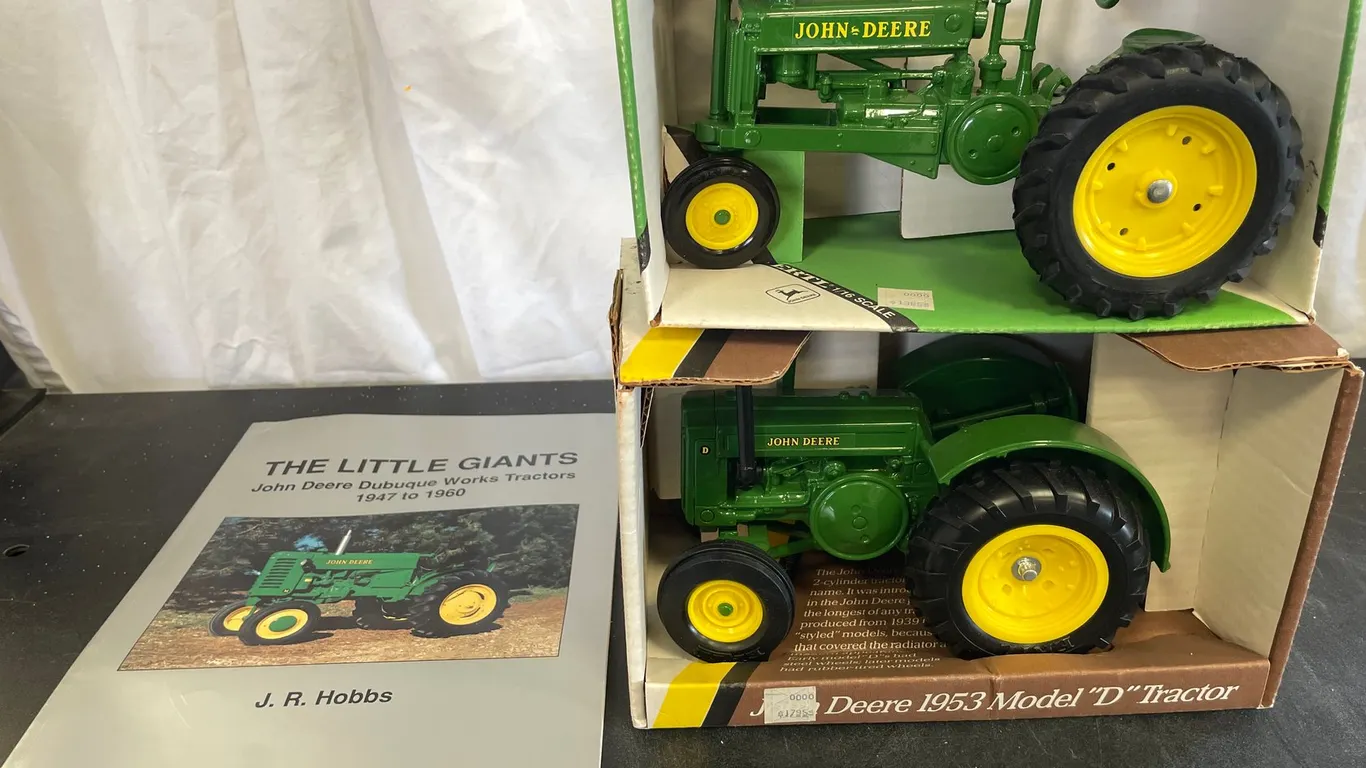 (2) John Deere Tractors and Book