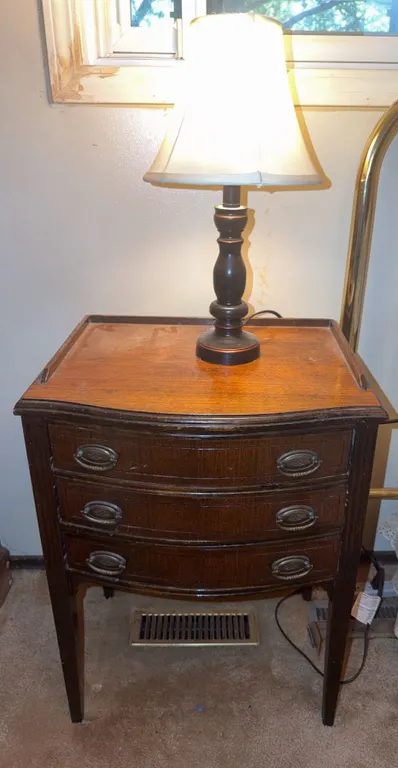 Wood Three-Drawer Side Table with Brass Pulls and Table Lamp