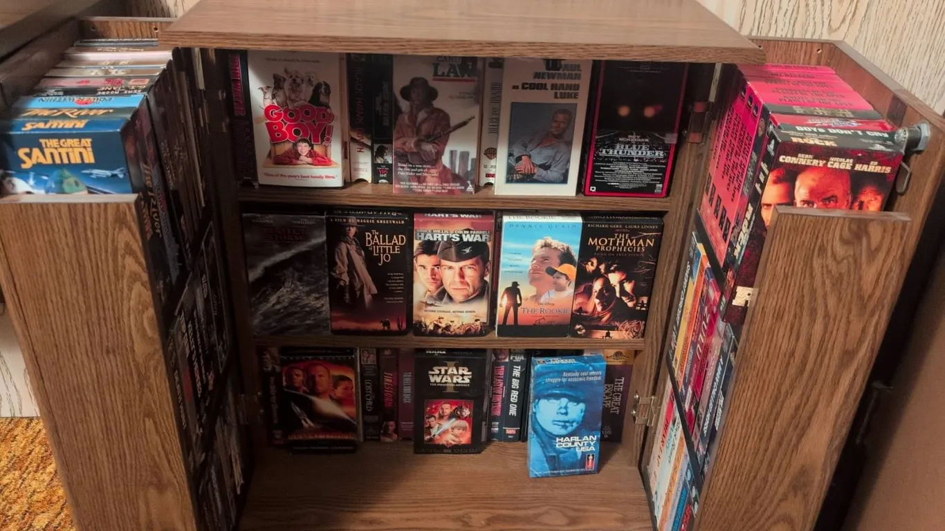 Woodgrain Storage Cabinet With 60 VHS Tapes