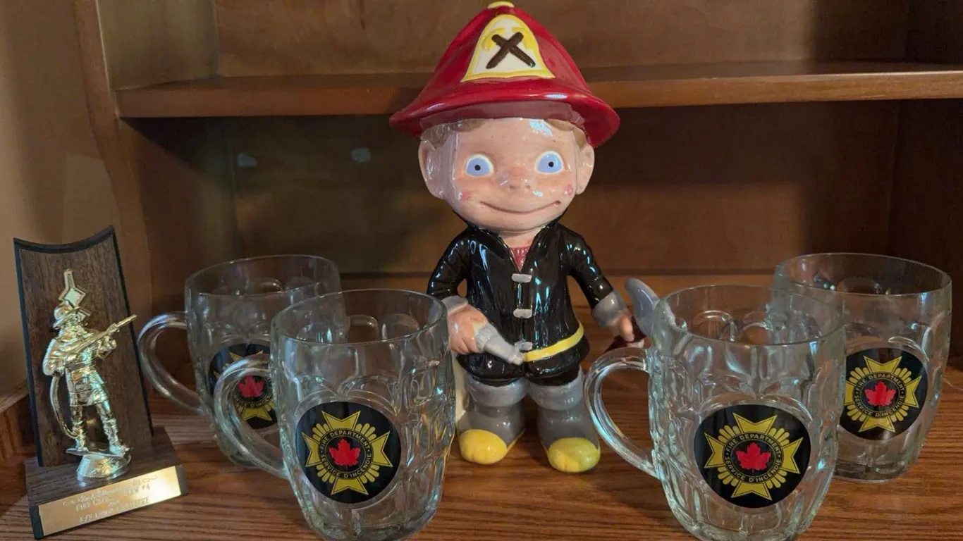 Firefighter Collectible Set with 1982 Trophy, Four Mugs, and Ceramic Figurine