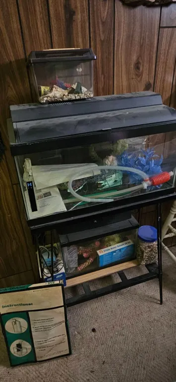 Three Fish Tanks With Accessories and Stand