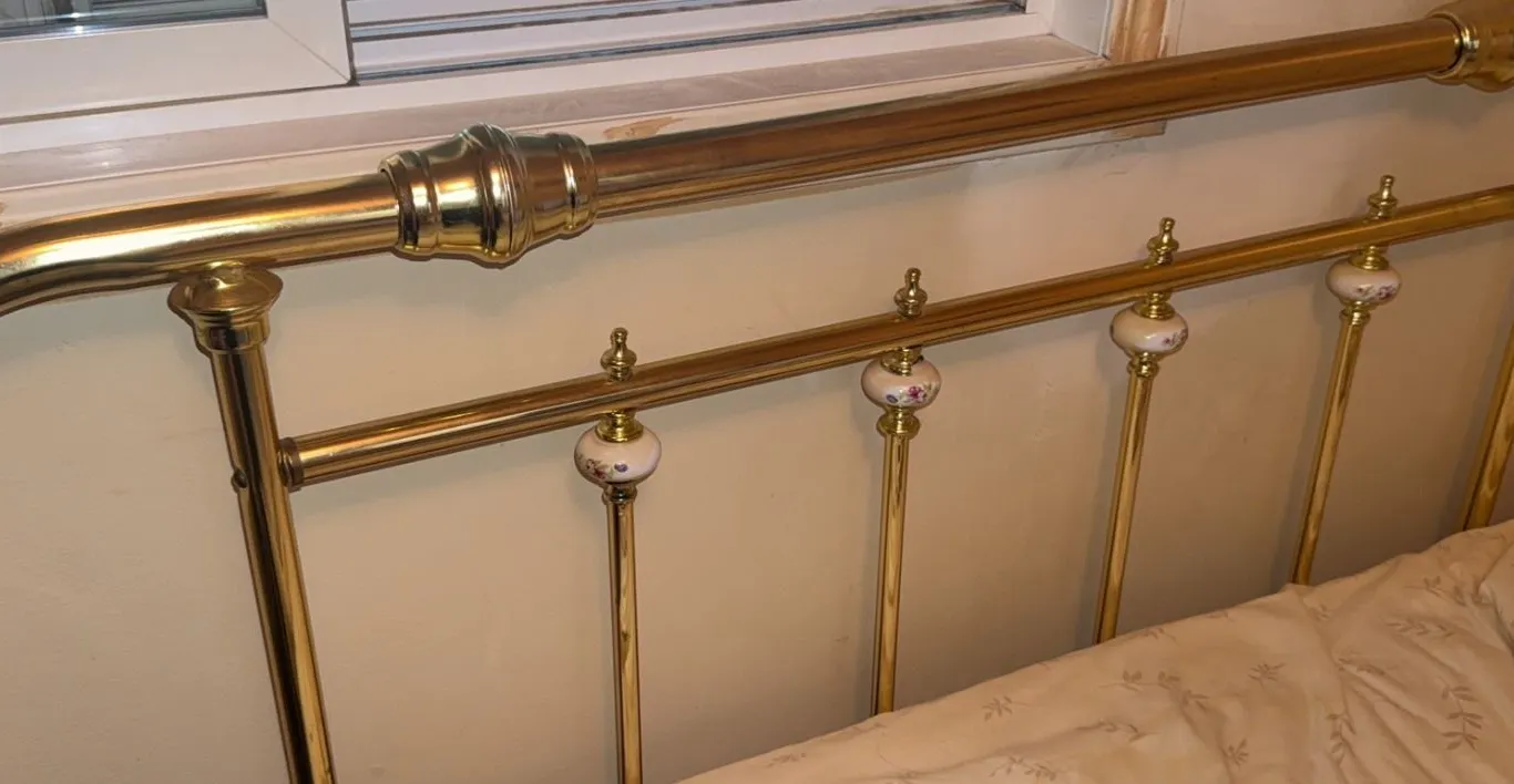 Brass Bed Frame with Porcelain Floral Accents and Mattress