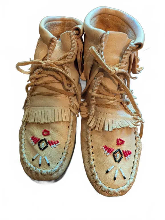 Tan Leather Beaded Moccasin Boots With Fringe And Rubber Soles