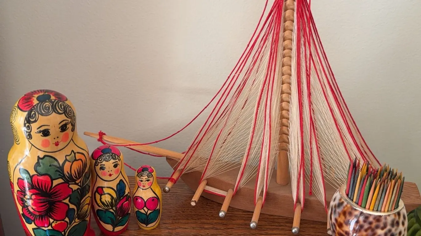 Russian Nesting Dolls, Shell Toothpick Holder, and Wooden Model Sailboat