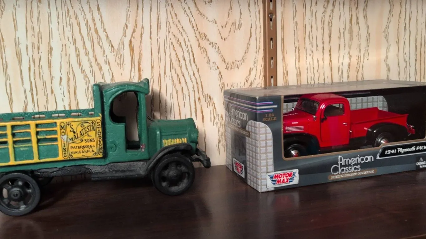2 Die-Cast Vehicles: Motor Max 1941 Plymouth Pickup and Malatest & Sons Farm Truck
