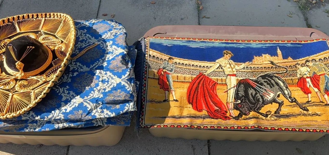 Mexican Sombrero, Blue Damask Curtains, and Bullfighting Tapestry