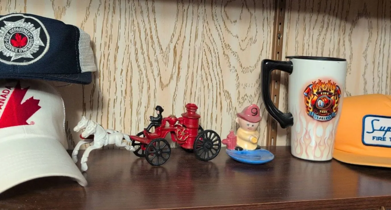 Firefighter Hats, Toy Fire Wagon, Mug, and Figurine Lot