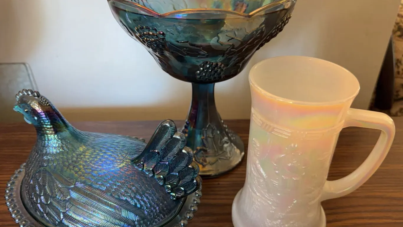 Three-Piece Carnival Glass Lot: Covered Hen Dish, Grape Pattern Compote, and Westmoreland Milk Glass