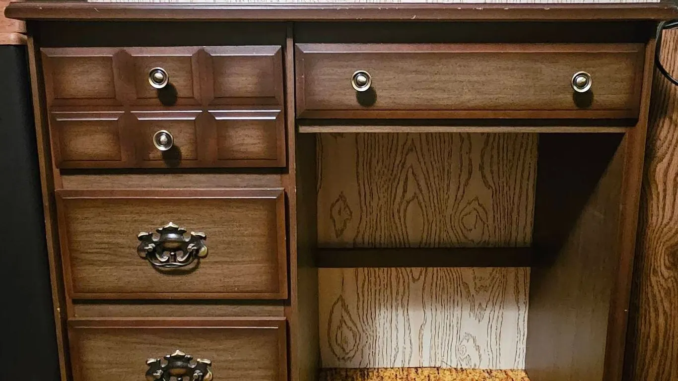 Wooden Desk with Multiple Drawers and Brass Handles