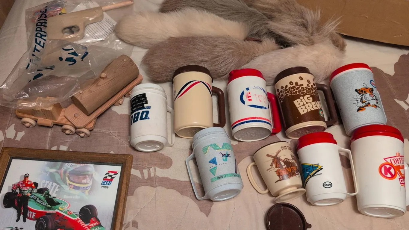 Plastic Mugs, Framed Racing Print, Wooden Toys, and Faux Fur Tails