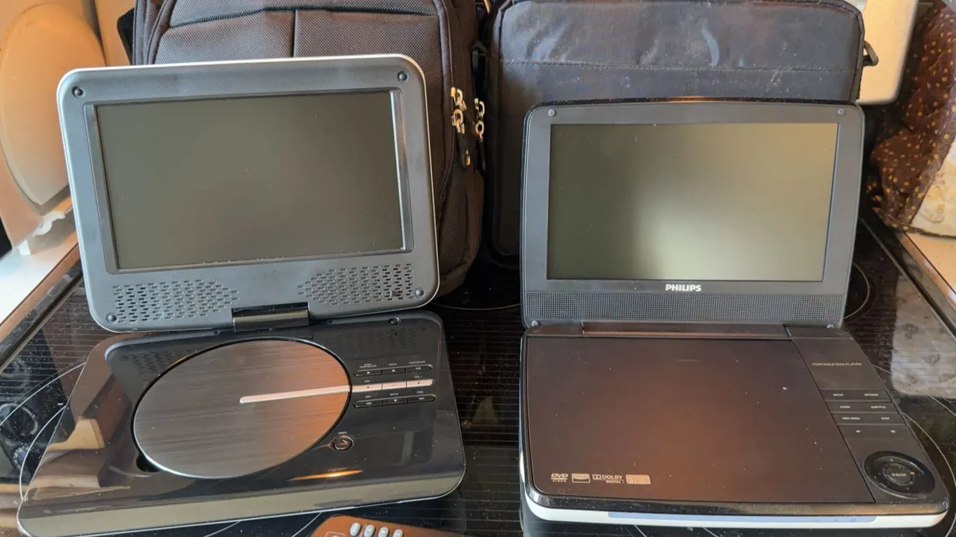 Philips and Unbranded Portable DVD Players with Cases and Remote