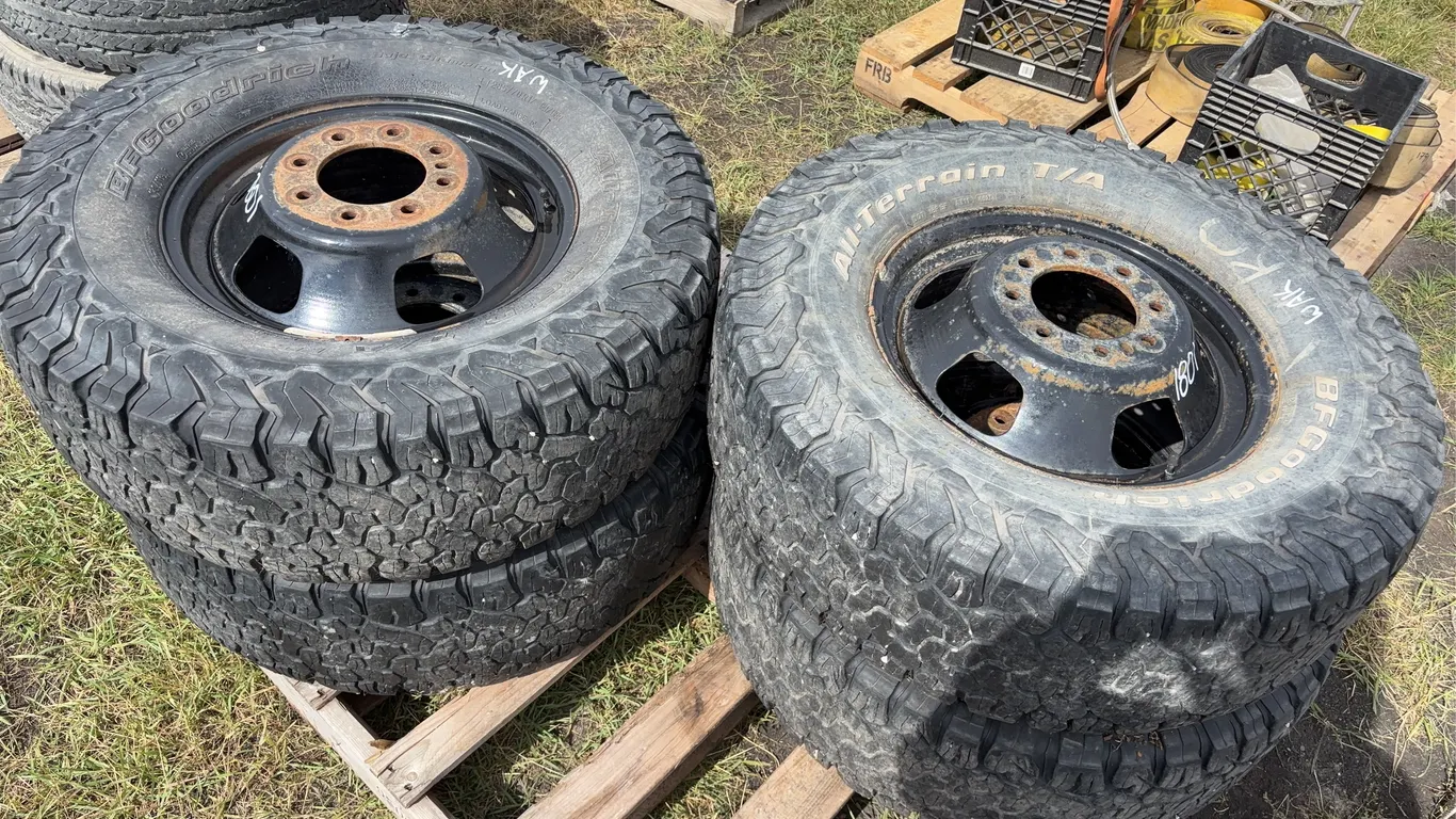 4 BF Goodrich All Terrain Tires, 285/70R17 w/ 8 bolt rims, Bolt Pattern 8x6.5'', 12 cm Center Hole *Unreserved*