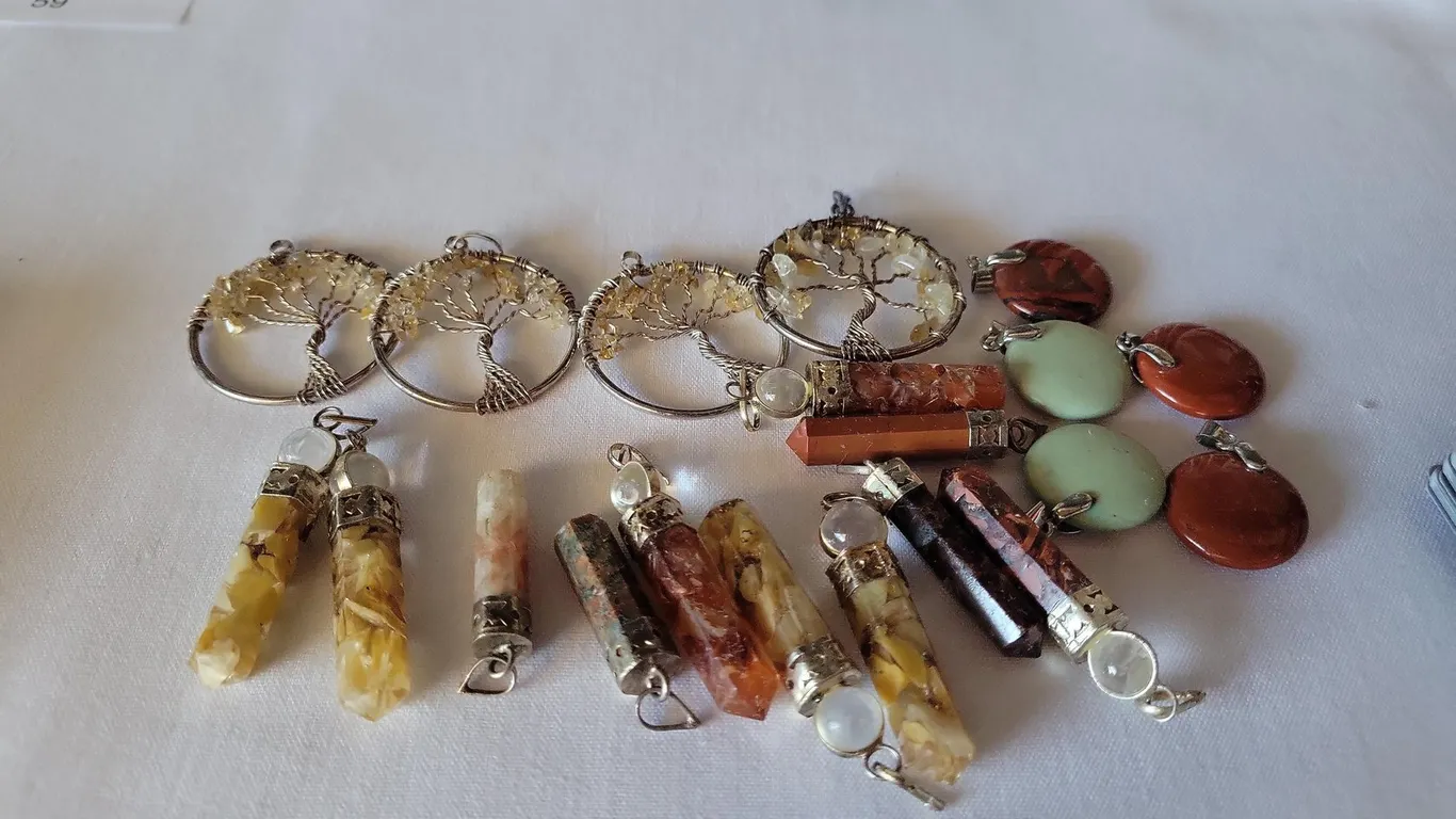 LOT OF CRYSTAL PENDANTS AND MORE