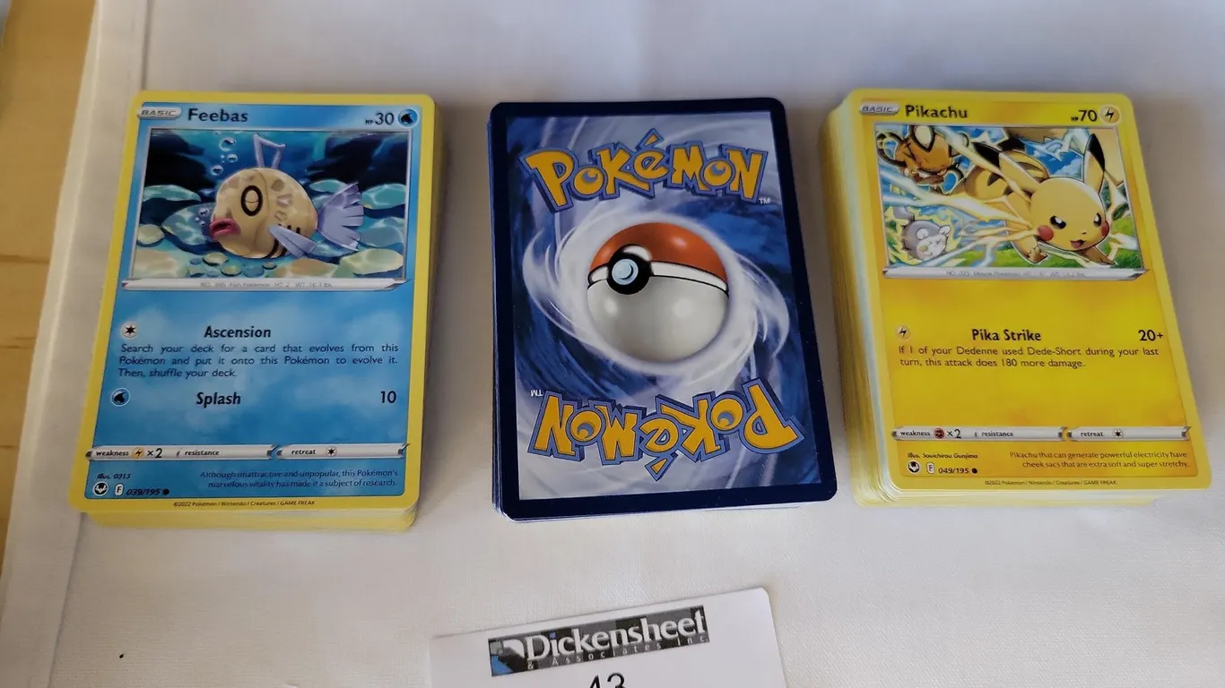 (150) POKÉMON CARDS LOT