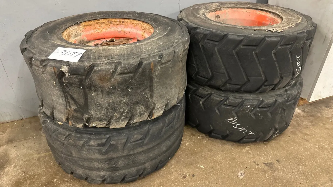 (4) Skid Steer Tires And Rims