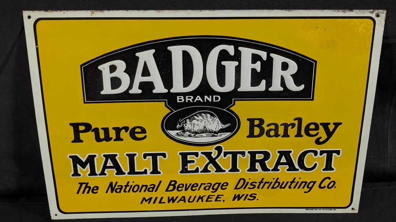 EMBOSSED TIN SIGN BADGER PURE BARLEY MALT EXTRACT MILWAUKEE WISCONSIN