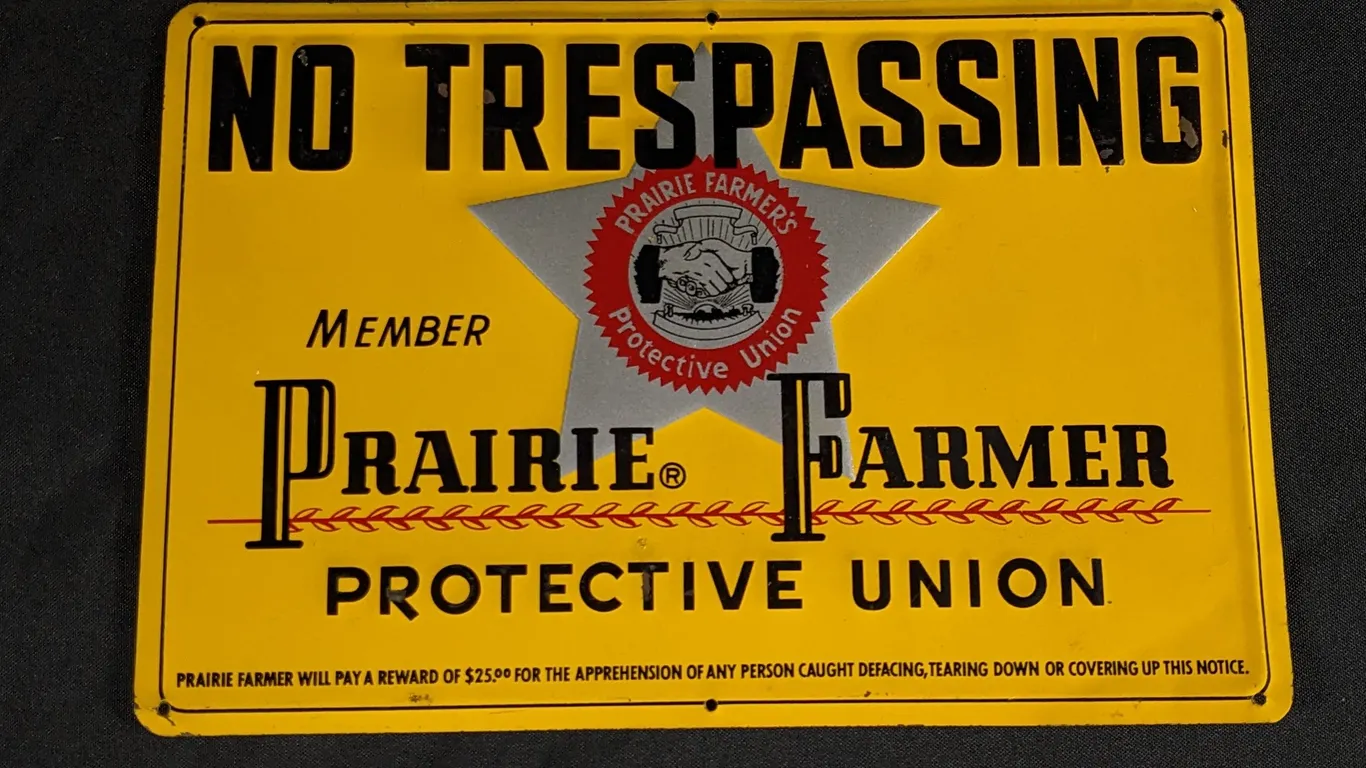 EMBOSSED TIN SIGN NO TRESPASSING PRAIRIE FARMER PROTECTIVE UNION