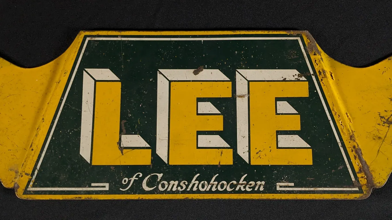 TIN TIR RACK SIGN LEE OF CONSHOHOCKEN