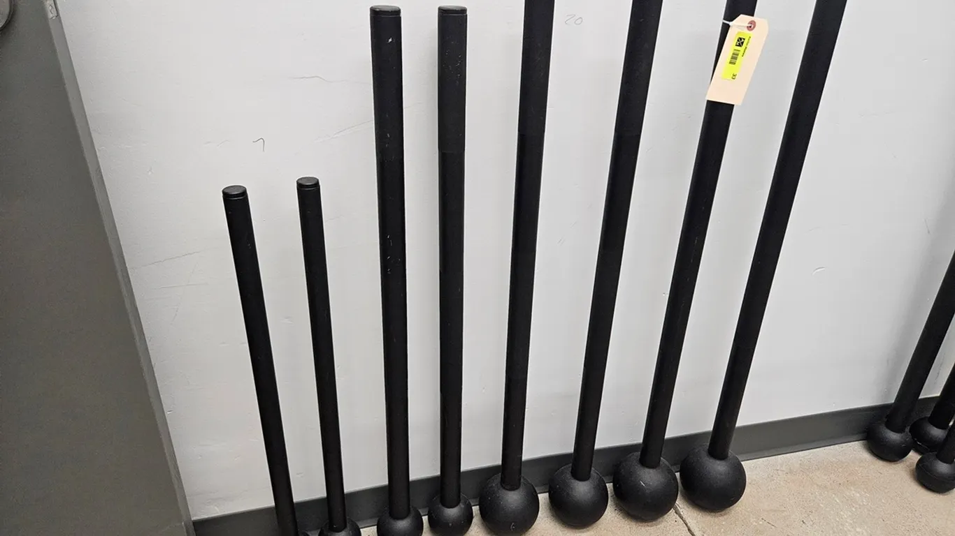 8 Rogue Macebells, 2 - 25 lb., 2 - 20 lb., 2 - 10 lb., 2 - 7 lb.
