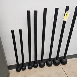 8 Rogue Macebells, 2 - 25 lb., 2 - 20 lb., 2 - 10 lb., 2 - 7 lb.