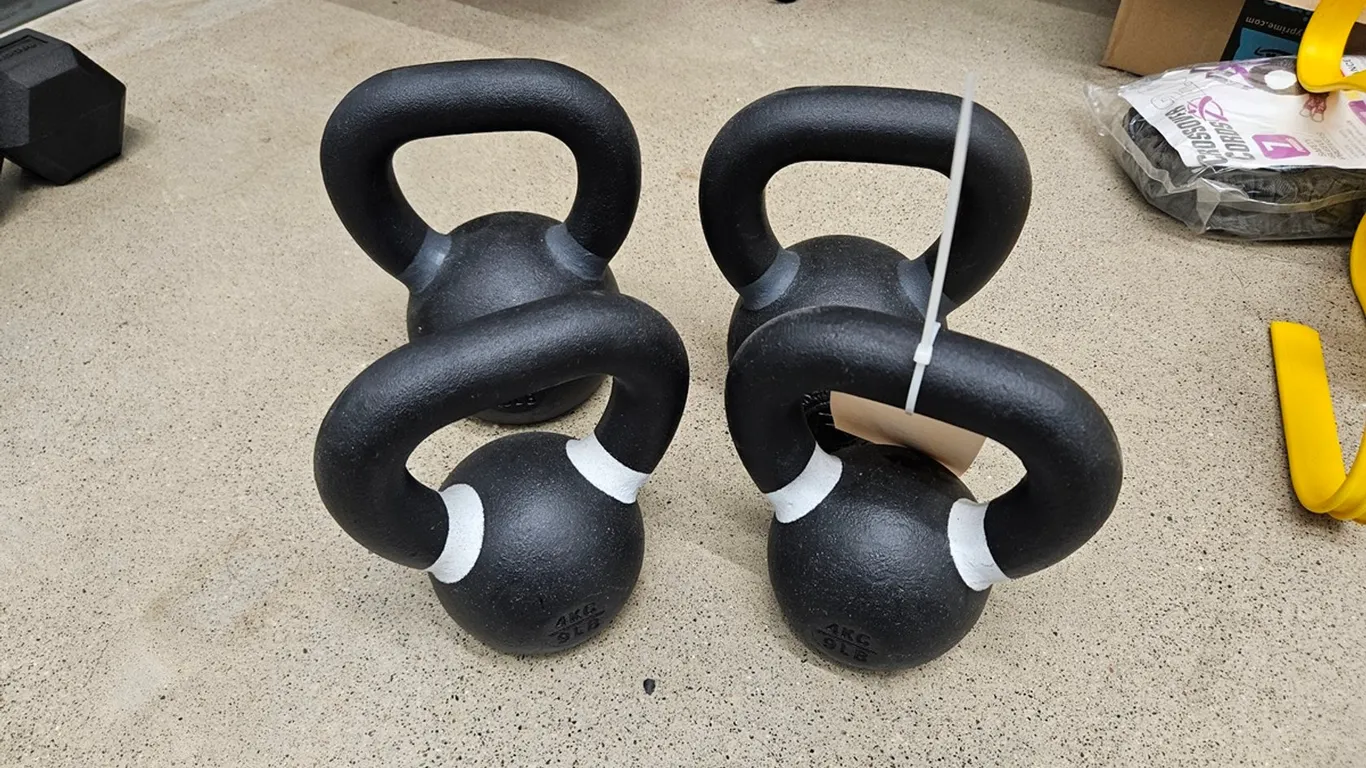4 Rogue Kettlebells (like new), 2 - 9 lb., 2 - 13 lb.