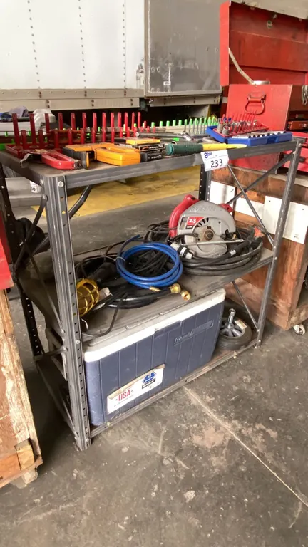 SMALL METAL SHELVING UNIT WITH ASSORTED TOOL CONTENTS- SKILSAW, STAPLE GUNS, COLEMAN COOLER, SOCKET