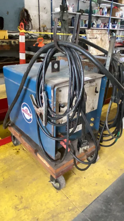 MILLER DIALARC 250-AC/DC ARC WELDER ON MOBILE CART