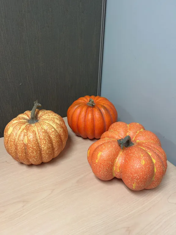 Three Faux Decorative Pumpkins in Orange Tones