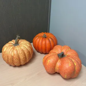 Three Faux Decorative Pumpkins in Orange Tones