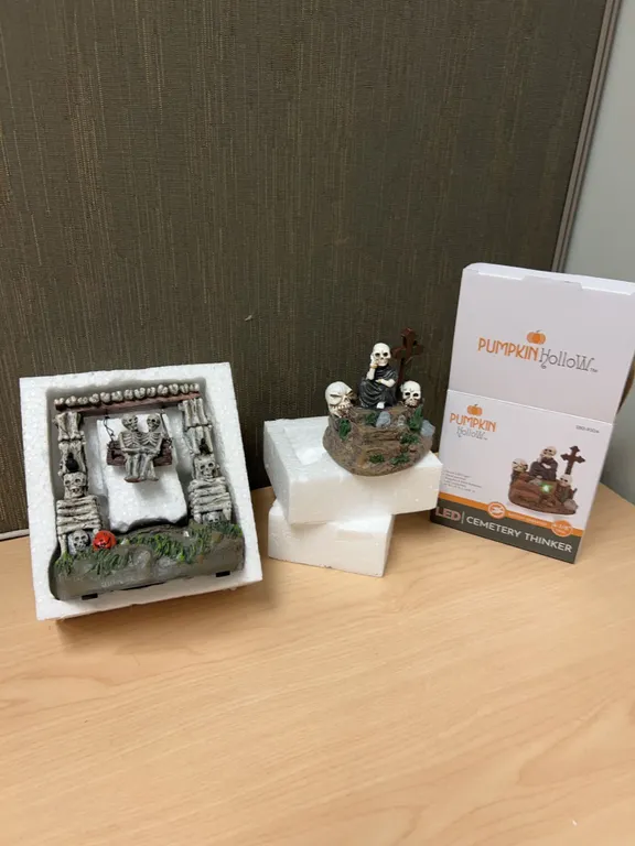 Pumpkin Hollow LED Cemetery Thinker and Skeleton Swing Figures