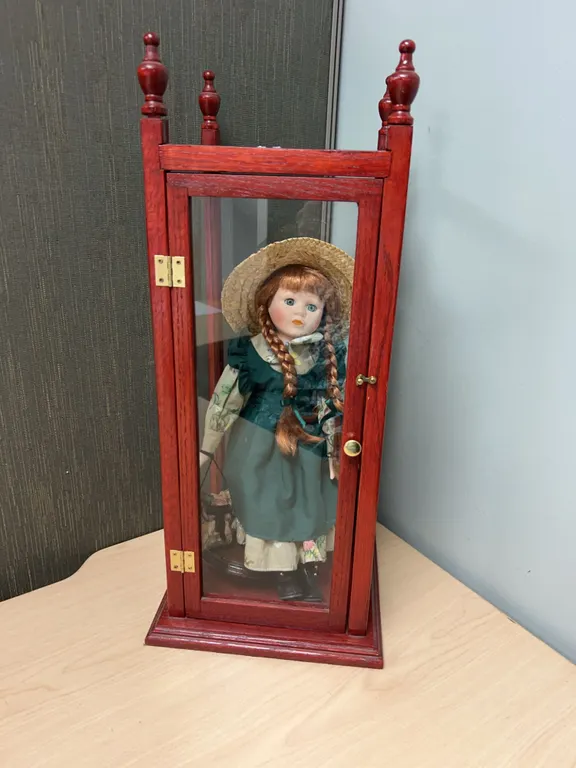 Porcelain Doll with Braided Hair in Display Case