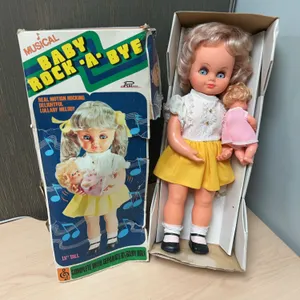 AM Toys Musical Baby Rock-A-Bye Doll with Baby Doll Set