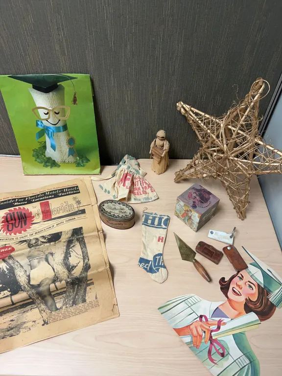 Ephemera and Small Collectibles Including Tins and Keychains