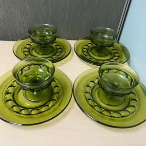 Four Green Glass Plates and Sherbet Cups