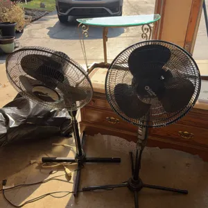 Two Pedestal Electric Fans