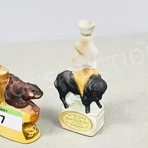 pair- Hudson's Bay 2oz figurine decanters 1975