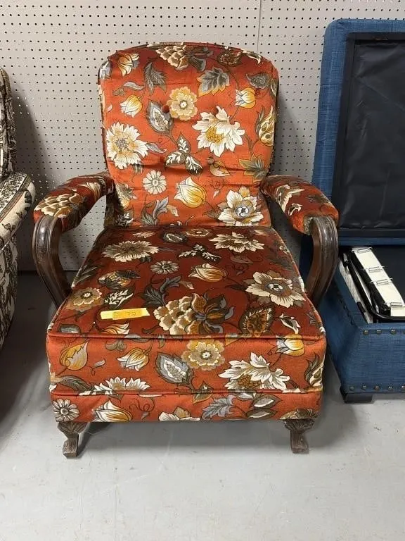 Vintage orange floral upholstered armchair
