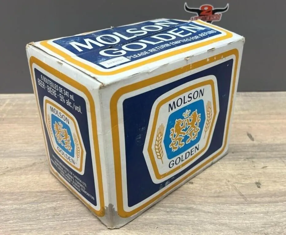 Six Pack of Molson Golden Stubby Beer Bottles.